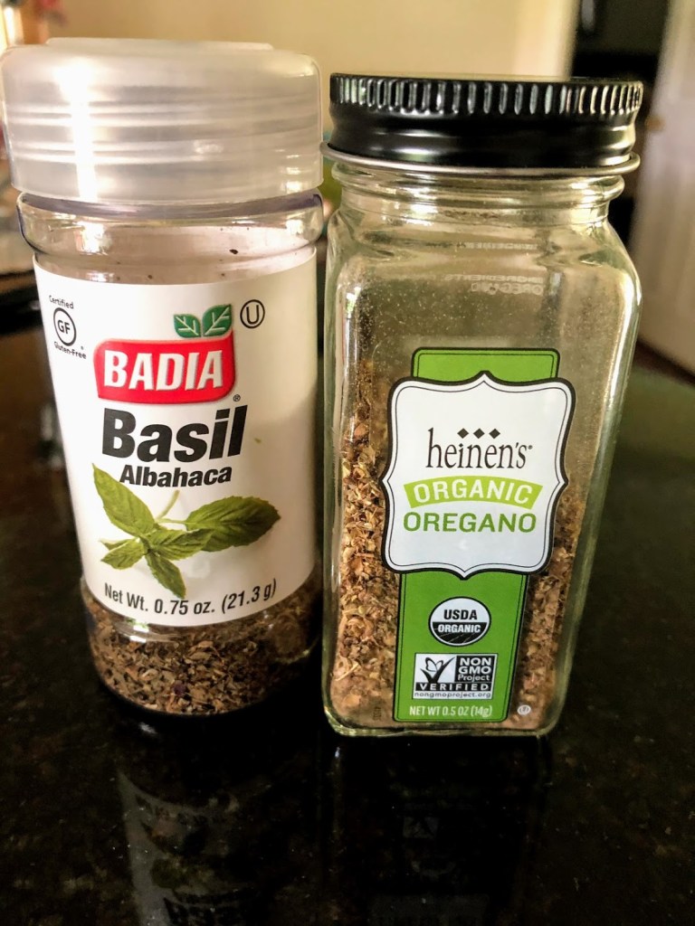 Dried basil and oregano containers
